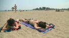 People crowded to beaches trying to stay cool during a heat wave in Toronto, Monday, July 5, 2010.