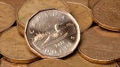 The Canadian dollar was down about two-thirds of a US cent Wednesday as the Bank of Canada said it was keeping its key rate unchanged at one per cent amid expectations of weaker than expected economic growth. (Jonathan Hayward / THE CANADIAN PRESS)
