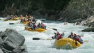 People are seen whitewater rafting in this undated photo from Glacier Raft Company Limited. 