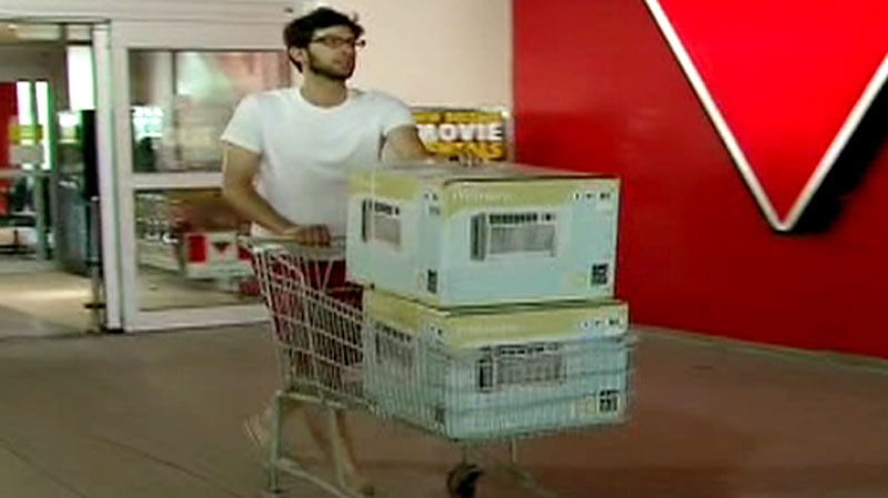 A man buys two air conditioners to cope with the extreme heat.