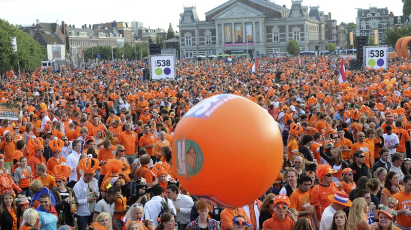Dutch fans watch during the World Cup semi final match against Uruguay being played in Cape Town, South Africa, on a screen at Museum Square in Amsterdam, Netherlands, Tuesday, July 6, 2010. (AP / Ermindo Armino)