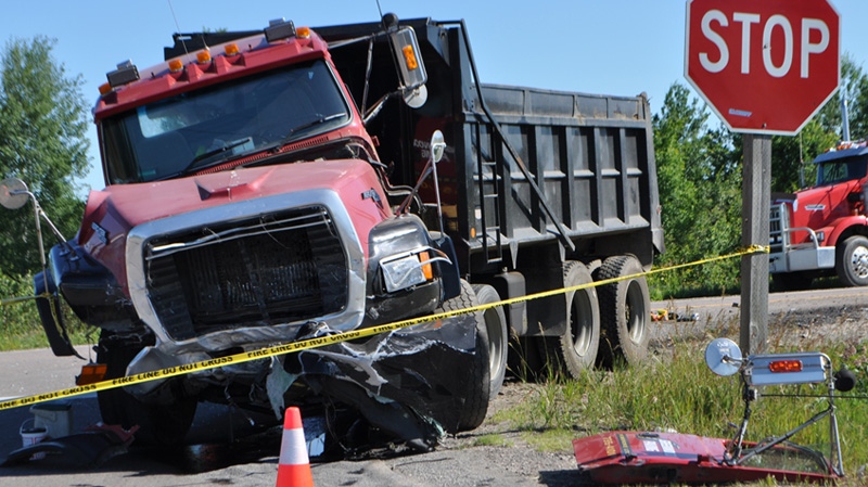 A woman is dead after a dump truck smashed into the car she was driving on Highway 17 just west of Renfrew, June 27, 2012.
