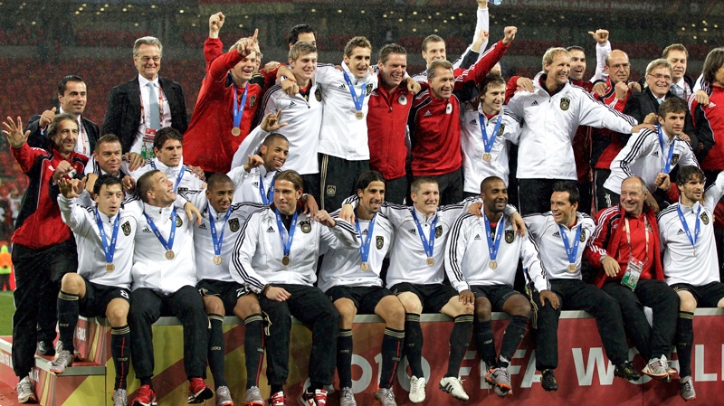 German players celebrate their 3-2 win after the World Cup third-place soccer match between Germany and Uruguay at Nelson Mandela Bay Stadium in Port Elizabeth, South Africa, Saturday, July 10, 2010. (AP / Fernando Vergara)