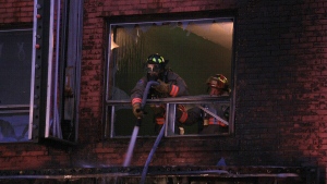Firefighters battle a blaze at Bathurst and Wolseley Streets early Thursday morning. (Tom Stefanac/CTV News)