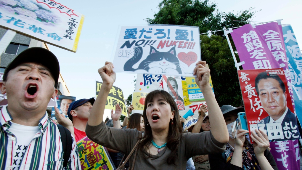 Protesters shout slogans during an anti-nuclear protest