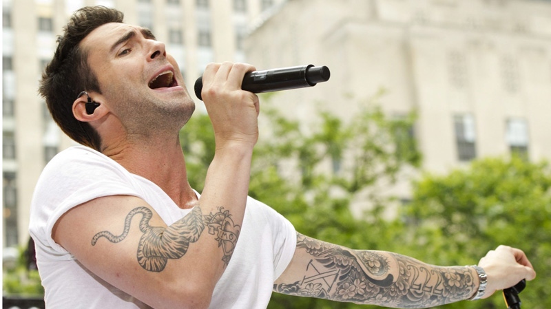 Maroon 5 front man Adam Levine performs Friday, June 29, 2012 in New York. (Charles Sykes / Invision)