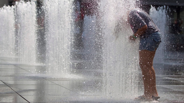 Hot weather - cooling off at fountain