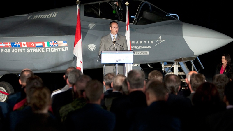 Minister of National Defence and Minister for the Atlantic Gateway Peter MacKay makes an announcement infront of a F-35 Joint Strike Fighter in Ottawa, Friday July 16, 2010. (Adrian Wyld / THE CANADIAN PRESS)