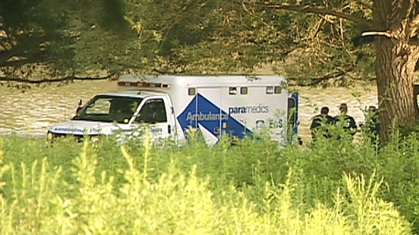 Paramedics at the scene of a drowning at the G. Ross Lord Park resevoir at Dufferin Street and Finch Avenue West on Friday, July 16, 2010.