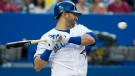In this file photo, Toronto Blue Jays right fielder Jose Bautista ducks from a pitch thrown by Kansas City Royals starting pitcher Luis Mendoza during AL baseball action in Toronto on Wednesday, July 4, 2012. (The Canadian Press/Nathan Denette)