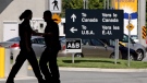 Canadian Border Services agents are seen in this 2009 file photo. (Darryl Dyck / THE CANADIAN PRESS)