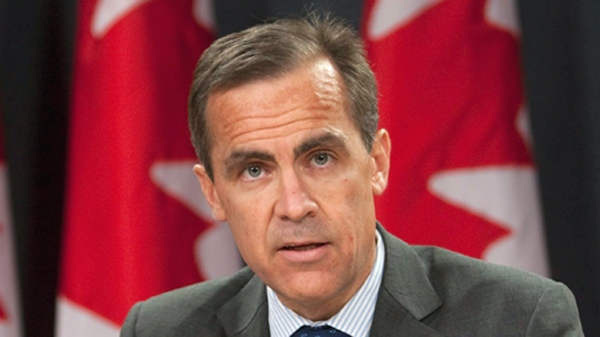 Bank of Canada Governor Mark Carney speaks with the media following the release of the Monetary Policy Report in Ottawa, Thursday April 22, 2010. (Adrian Wyld / THE CANADIAN PRESS)