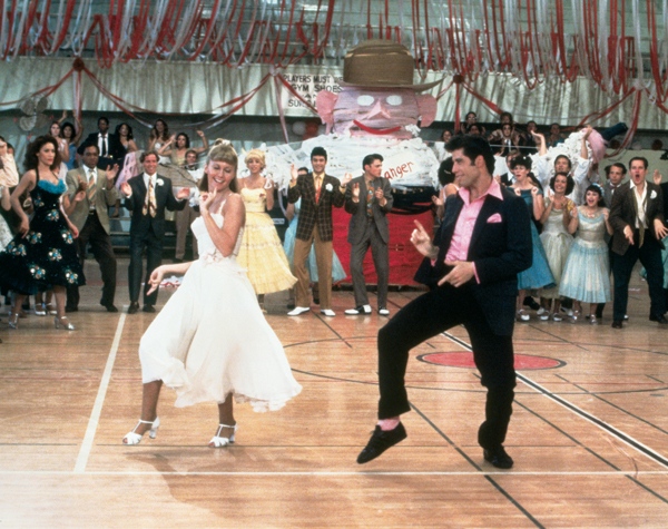 Left to right: Olivia Newton-John (as Sandy Olsson) and John Travolta (as Danny Zuko) in "Grease." (Paramount Pictures)
