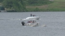 A Toronto man, 72, is in hospital after the pontoon plane he was piloting in cottage country crashed into a crowded barge on take off on Monday, July 9, 2012.