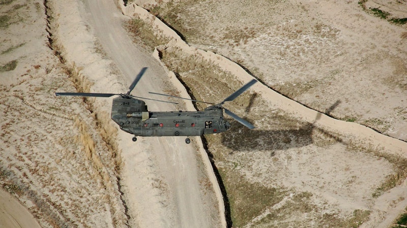 A Canadian CH-47D Chinook battlefield helicopter takes off from undisclosed forward operating base, west of Kandahar after dropping off troops Friday Feb. 20, 2009. (THE CANADIAN PRESS/ Murray Brewster)