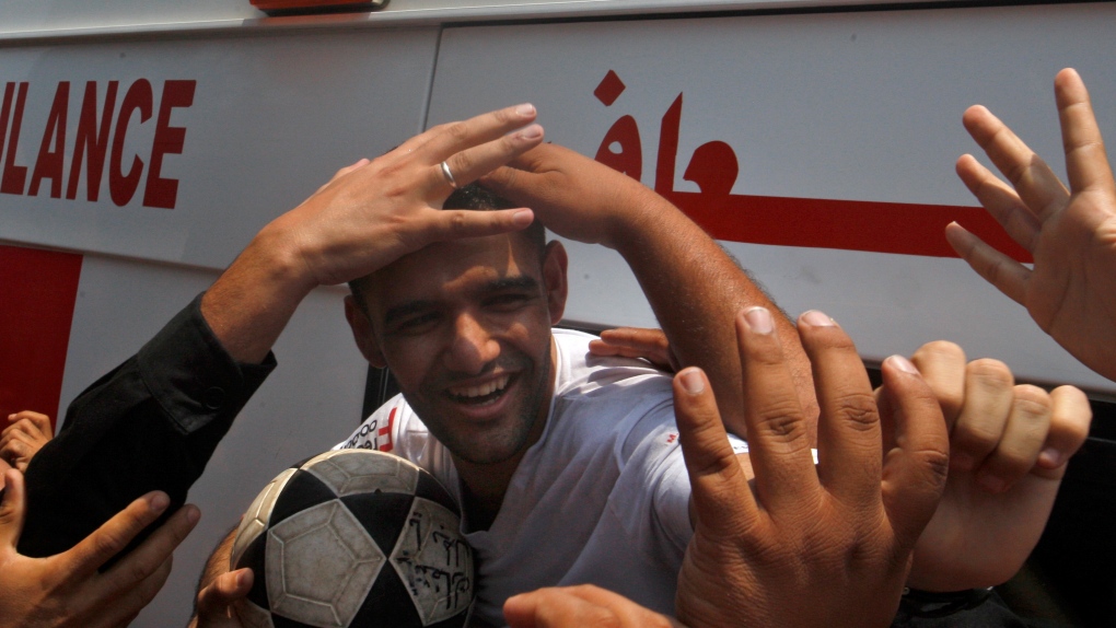 Palestinian soccer player Mahmoud Sarsak arrives at al-Shifa hospital in Gaza City