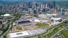 The grounds of the Calgary Stampede are shown in this aerial photo with the city of Calgary, Alta., in the background on Saturday, July 7, 2012. (Calgary Stampede / Chris Bolin)