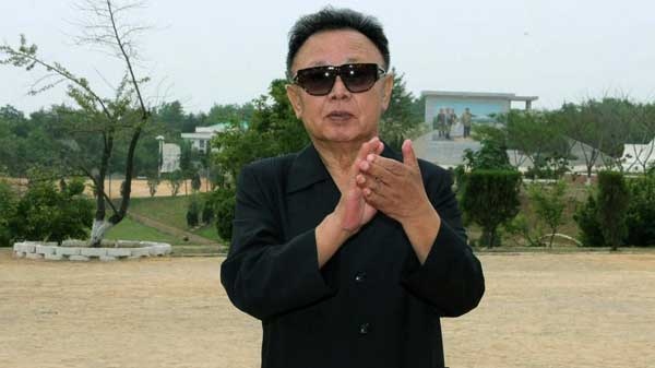 In this undated photo released by Korean Central News Agency in North Korea and distributed by Korea News Service in Tokyo on Monday, June 21, 2010, North Korean leader Kim Jong Il gestures while meeting with miners, unseen, at Pyeong-an puk-do in North Korea. (AP / Korean Central News Agency via Korea News Service)