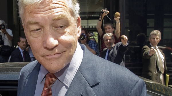 Conrad Black leaves after his bail hearing at U.S. federal court in Chicago, Friday, July 23, 2010. (Ryan Remiorz / THE CANADIAN PRESS)  