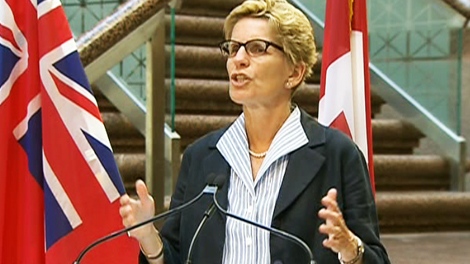 Minister of Transportation Kathleen Wynne speaks to the media in Toronto on Monday, July 26, 2010.