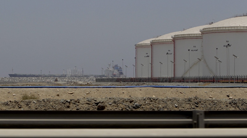 In this May 30, 2012 file photo, a ship docks at the refueling station in Fujairah, United Arab Emir