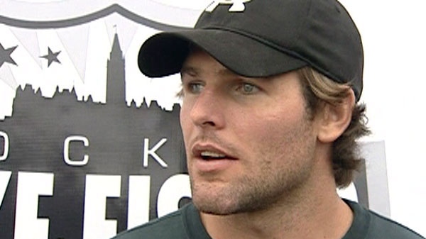 Mike Fisher talks to reporters in Ottawa about his wedding to Carrie Underwood earlier this month.