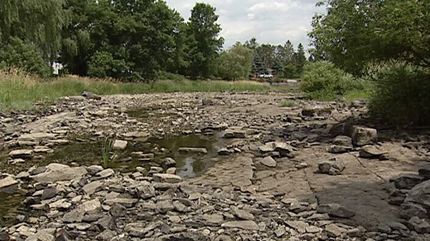 Water levels in the Jock River are down to a trickle in some areas Tuesday, July 17, 2012.
