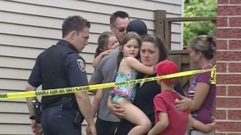Parents take their children home from an Orleans daycare after a toddler drowned in the backyard swimming pool, Wednesday, July 28, 2010.