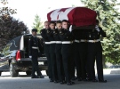 Military pallbearers carry the casket of Sapper Brian Collier at his funeral in Bradford, Ont., Thursday, July 29, 2010. (Nathan Denette / THE CANADIAN PRESS)  