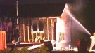 Fire crews battle a fire in a newly-renovated bungalow in L'Ange Gardien Wednesday, July 18, 2012.