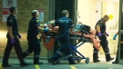 A Toronto EMS crew brings a victim of a shooting near Jane and Finch into Sunnybrook Hospital in Toronto, Friday, July 20, 2012. 