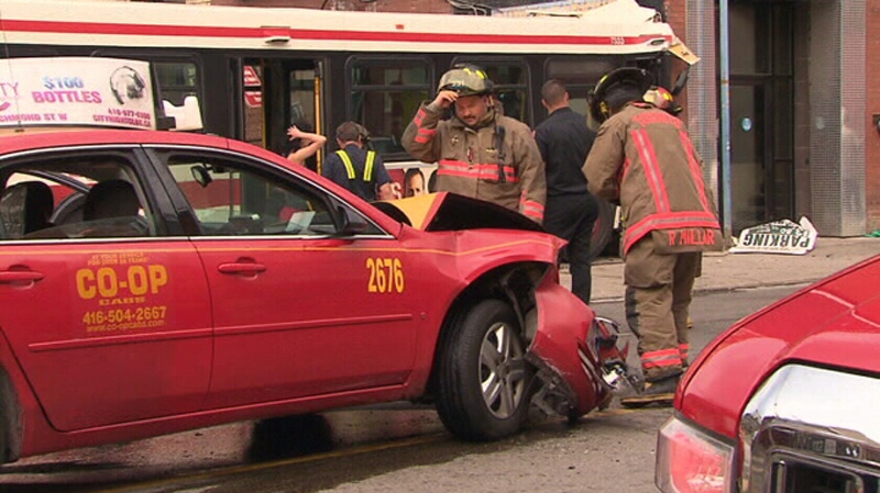 Two transported to hospital after TTC bus collides with building 
