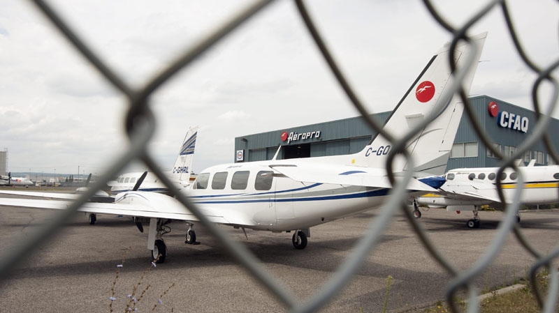 Aircraft from the Aeropro airline sit on the tarmac near the hangar Monday, August 2, 2010 at the airport in Quebec City. (THE CANADIAN PRESS/Jacques Boissinot)