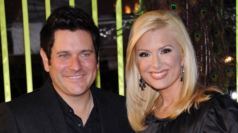 Jay DeMarcus of Rascal Flatts, left, and his wife, Allison at the 59th Annual BMI Country Awards.