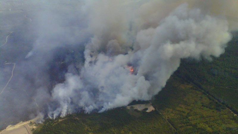 This aerial photo from Ontario's Ministry of Natural resources shows smoke rising from a training area used by CFB Petawawa over the weekend.