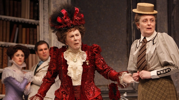 In this publicity image released by Stratford Shakespeare Festival, cast, from left, Sara Topham as Gwendolen Fairfax, Ben Carlson as John Worthing, Brian Bedford as Lady Bracknell and Sarah Dodd as Miss Prism are shown in a scene from the Stratford Shakespeare Festival production of, 'The Importance of Being Earnest.'