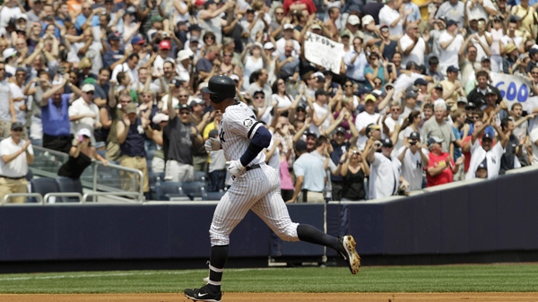 New York Yankees' Alex Rodriguez  rounds the bases after hitting his 600th career home run during the first inning of a baseball game against the Toronto Blue Jays at Yankee Stadium on Wednesday, Aug. 4, 2010. (AP / Kathy Willens)