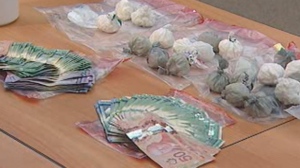Winnipeg police showed off drugs and cash seized from a residence in the 300 block of McKenzie Street. 