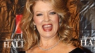 Mary Hart poses for a photograph after arriving at the 19th annual Broadcasting and Cable Hall of Fame Awards in New York, Tuesday, Oct. 20, 2009. (AP / Kathy Willens)