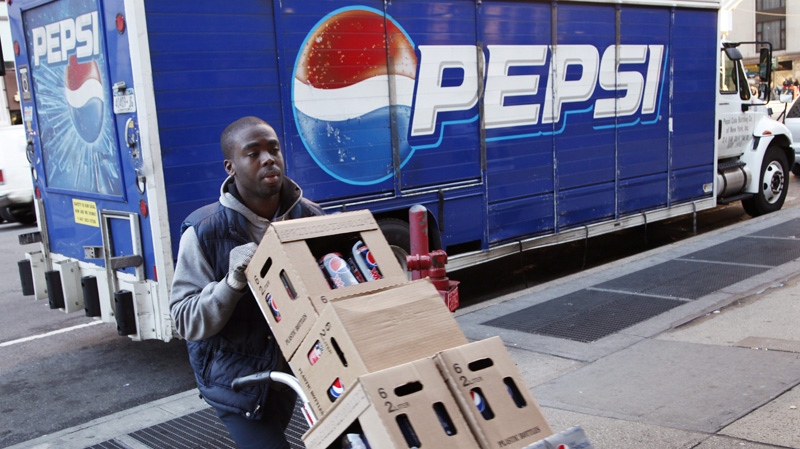 Kandral McKenzie delivers Pepsi products on Feb. 9, 2012 in New York.