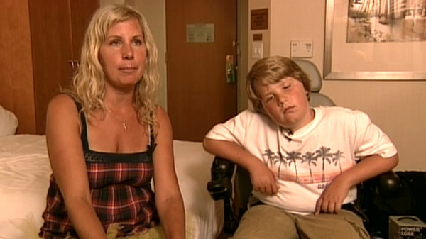 Tanner Bawn and his mother discuss their experience from New York City, Thursday, Aug. 5, 2010.