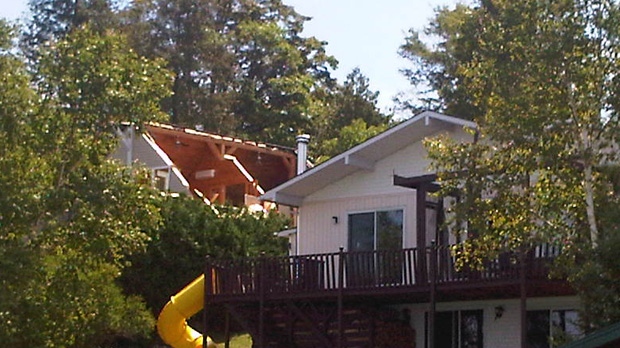A cottage roof was torn off by a marcoburst, or large blast of wind, on Norway Lake in Renfrew County Monday, July 23, 2012.