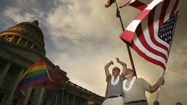 James Grady and Mike Picardi cheer the news as advocates for gay marriage rally on Capitol Hill in Salt Lake City after a federal court judge overturned California's same-sex marriage ban Wednesday, Aug. 4, 2010. (The Salt Lake Tribune / Steve Griffin)