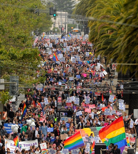 Hundreds of same-sex marriage supporters march through San Francisco celebrating a federal judge's decision overturning California's same-sex marriage ban on Wednesday, Aug. 4, 2010. (AP / Noah Berger)