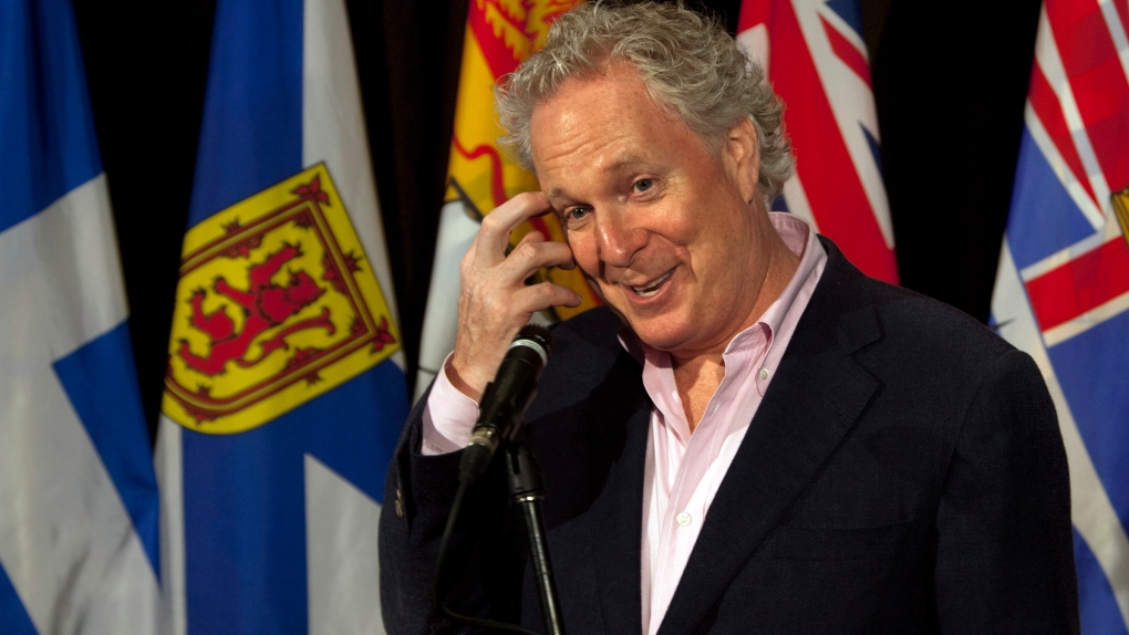 Quebec Premier Jean Charest fields a question at the annual Council of the Federation meeting