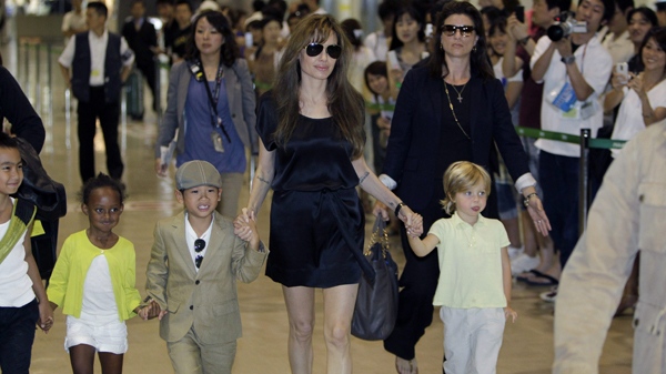 Angelina Jolie and her children from left, 8-year-old Maddox, Zahara Marley, 6, Pax Thien, 6, and Shiloh Nouvel, 4, arrive at Narita International Airport in Narita near Tokyo, Monday, July 26, 2010 for the Japan premiere of 'Salt.' (AP / Koji Sasahara)