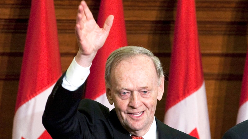 Former prime minister Jean Chretien waves following an unveiling ceremony of Chretien's official portrait in Ottawa, May 25, 2010. (Adrian Wyld / THE CANADIAN PRESS)