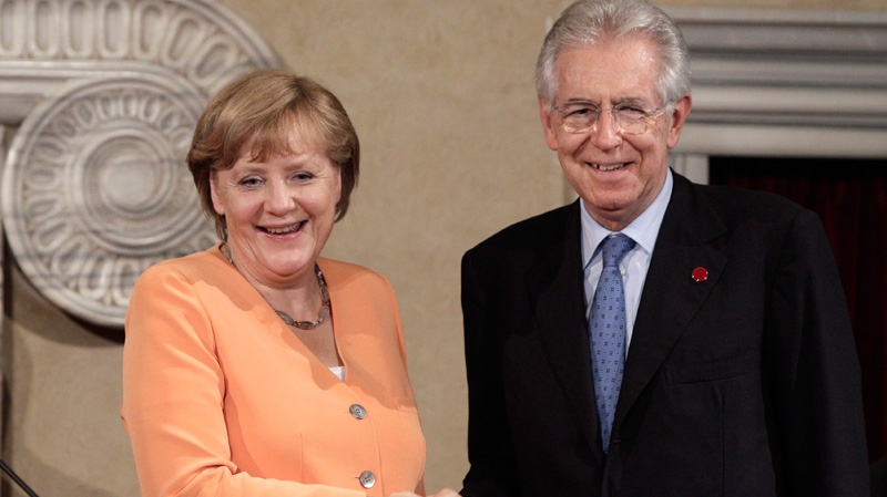 German Chancellor Angela Merkel, left, and Italian Premier Mario Monti 