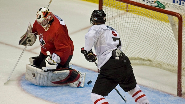 Louis Leblanc scores on Mark Visentin during an inter-squad game at the national junior hockey team development camp in St. John's, N.L. on Friday, August 6, 2010.THE CANADIAN PRESS /Andrew Vaughan