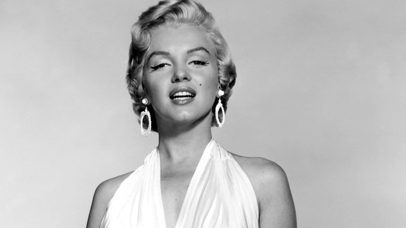 Marilyn Monroe is shown in the first photo taken of her in the famous white dress from the 'The Seven Year Itch.' (AP / Courtesy Running Press)